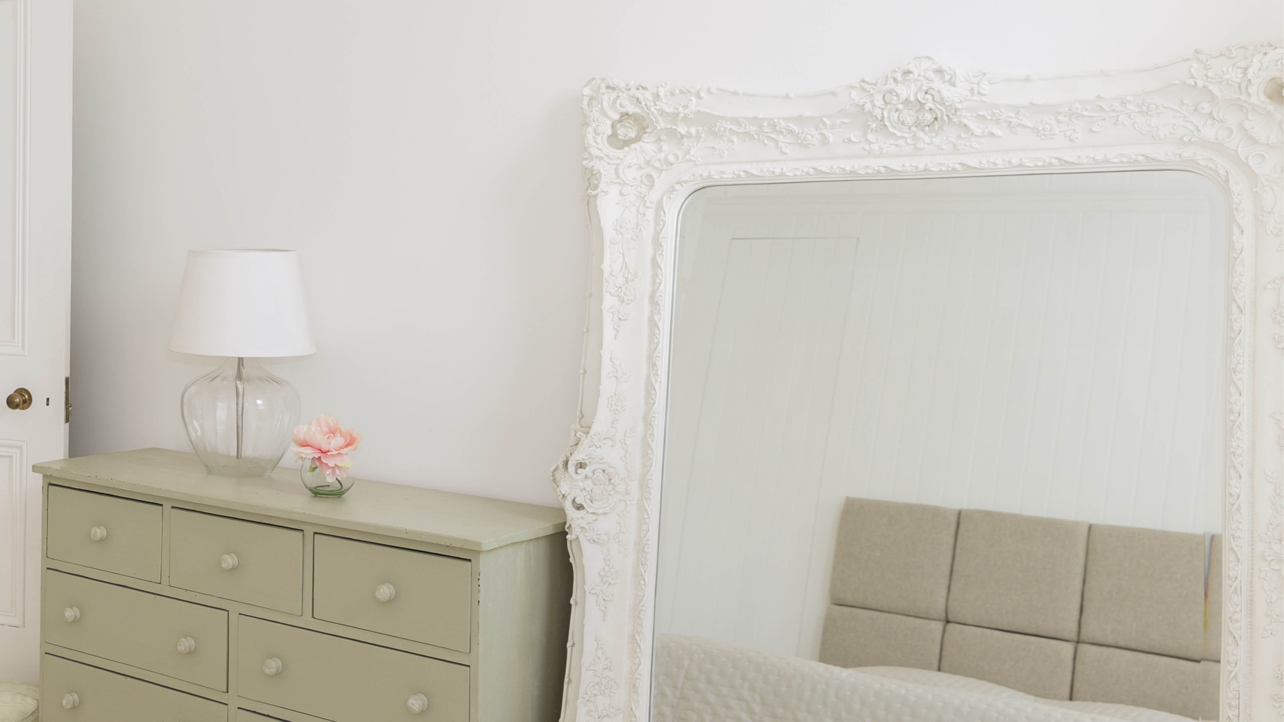Enhance space with a mirror By leaning a large mirror against a wall you’ll give the impression that the room is expanding and opening up at head height.